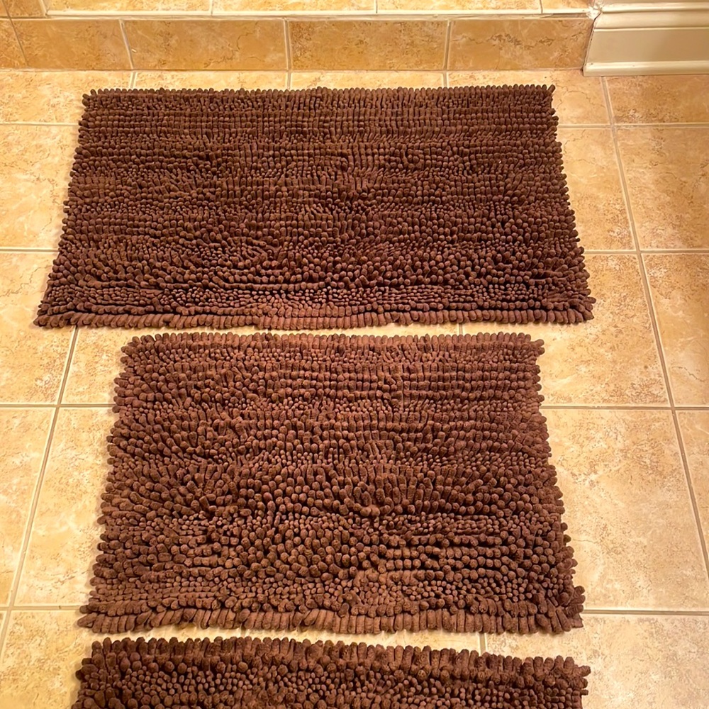 Chocolate bathroom rugs ( 1 large 1 small)